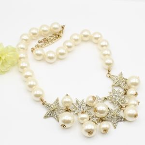 Pavé star & faux pearl statement necklace